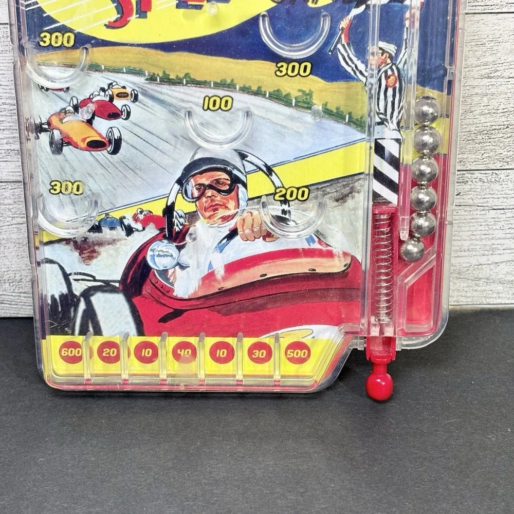 2007 Schylling 500 Mile Speedway‎ Hand Held Pinball Game
